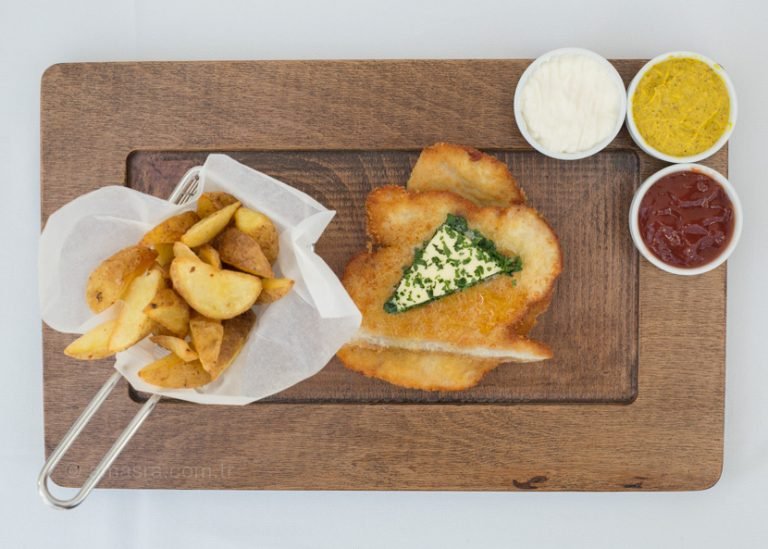 Plated fish and chips photographed for a restaurant menu